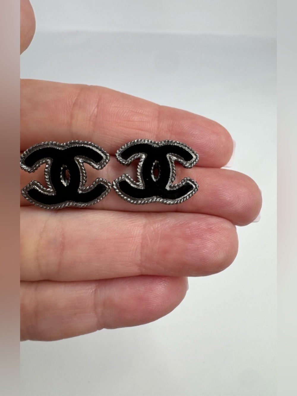 Authentic CHANEL Black Enamel CC Stud Earrings with Silver-Toned Trim